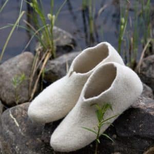 Fishing trip at lake with wool felt liners warm feet in cold weather