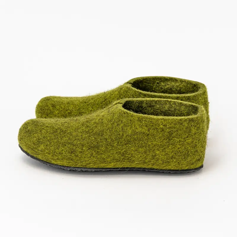 Moss green Lahtiset felt slippers photographed from the left side