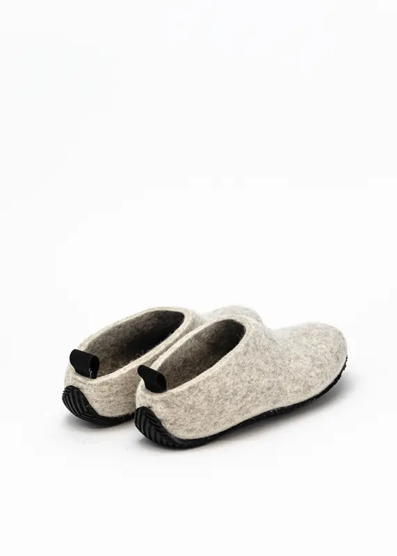 Grey wool-felt shoes photographed from the right side, with a black rubber sole and small pull loop.