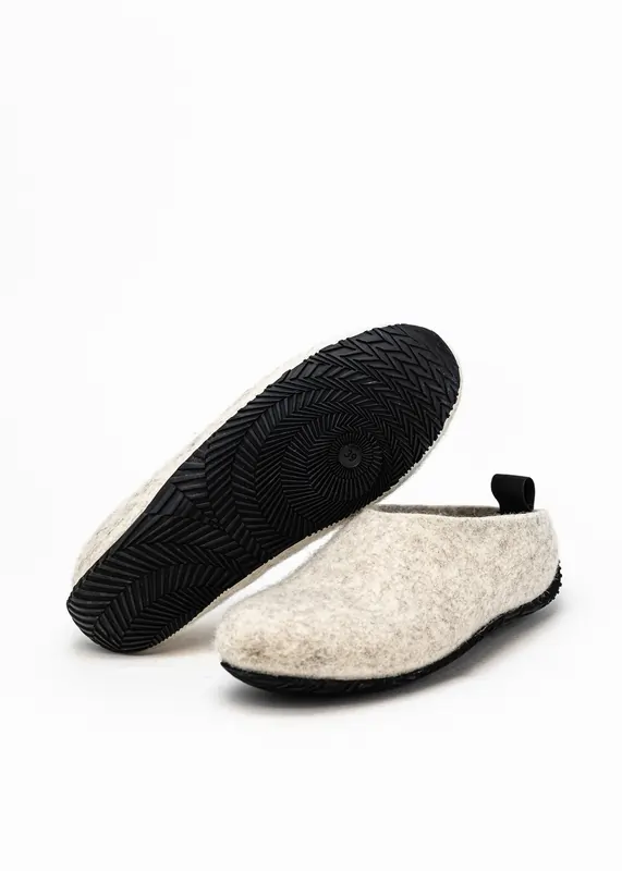 Grey wool-felt shoes with a durable black sole and black pull loop, sole texture visible.